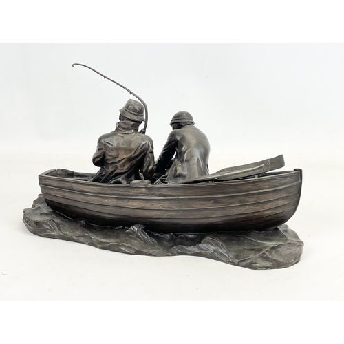 699 - A large resin figure “Anglers” Mayfly. 34cm