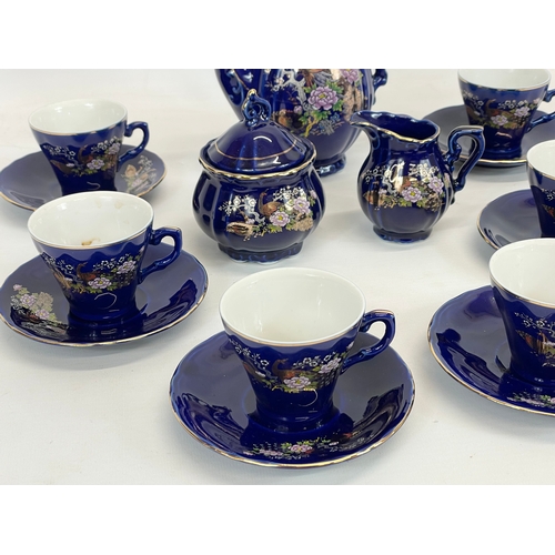 701 - A 15 piece Japanese tea set.