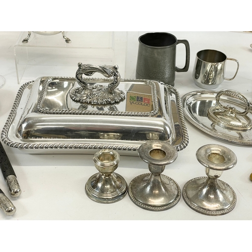 702 - A quantity of silver plate etc.