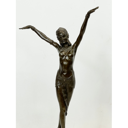 192 - A large Art Deco style bronze Egyptian Dancer on marble and slate base. Chiparus style. 56cm