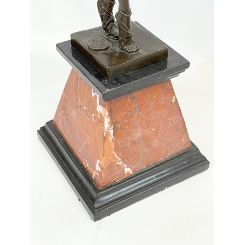 192 - A large Art Deco style bronze Egyptian Dancer on marble and slate base. Chiparus style. 56cm