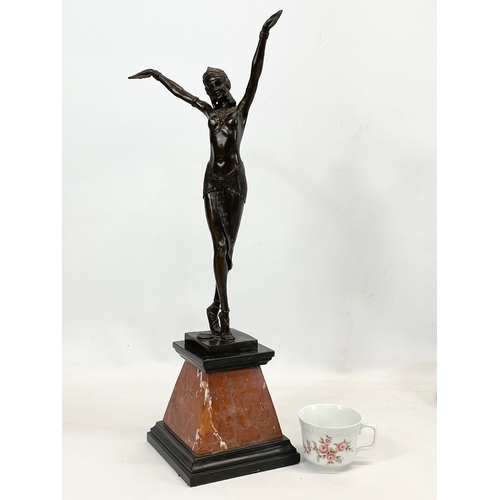 192 - A large Art Deco style bronze Egyptian Dancer on marble and slate base. Chiparus style. 56cm