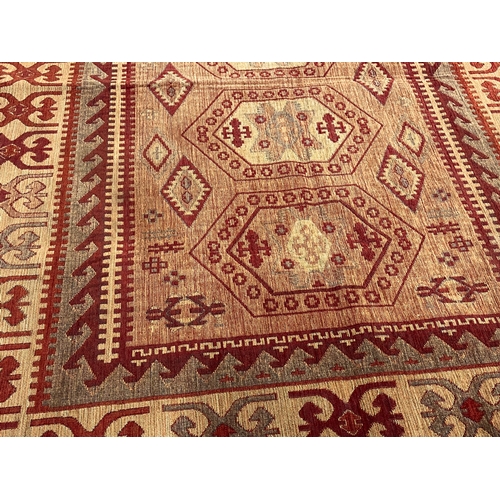 208 - A Middle Eastern style rug. 101 x 142cm