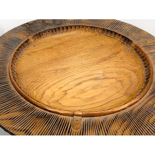 711 - An oak bowl by Scott Irvine. 35 x 5cm