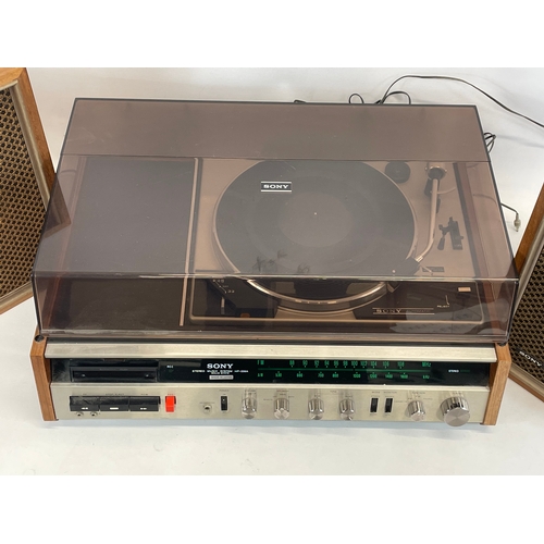 214 - A vintage teak Sony Stereo Music System. HP-239 A. Serial 68769. Mid Century. Made in Tokyo, Japan. ... 