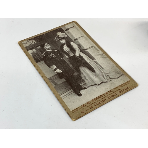 716 - 3 Coronation pottery cups and photo. A late 19th century Highlander Lancer 1899-1900 “Each Doing His... 