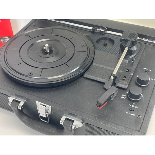 215 - An Akai record player. Model A60011N.