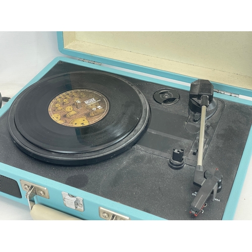 216 - A Crosley record player. Model CR8005A-TU.