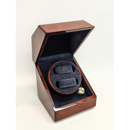 723 - A Rotary watch display case. 17.5x17.5x19cm