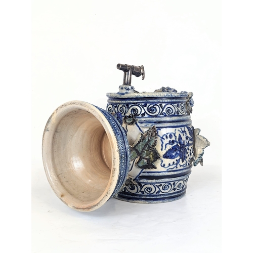 724 - An early 20th century German salt glazed dispenser with silver plated tap. 28x32x43cm