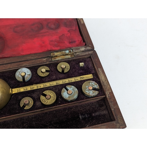 236 - 2 vintage Sikes' Hydrometers by M. Jordi & Co. Ltd. Dublin. With precision weights in case.