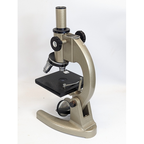 242 - 2 pieces of laboratory equipment including a Prior microscope.