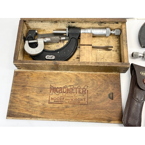 244 - A collection of vintage Micrometers Slide Gauges and Calipers by Moore & Wright.