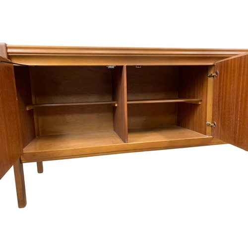 996 - A Mid Century teak sideboard. 168 x 44 x 74cm.