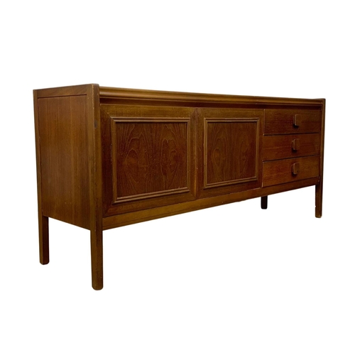 996 - A Mid Century teak sideboard. 168 x 44 x 74cm.