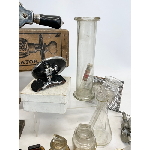 272 - A quantity of vintage chemical and laboratory equipment. Including a Dr Macaura’s Blood Circulator.