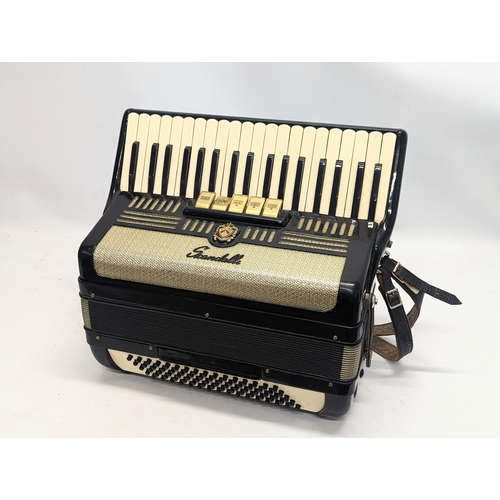 286 - A vintage Italian Scandalli accordion, supplied by Johnnie Owens, in case.