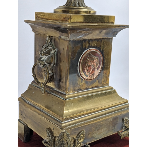 194 - A large pair of mid 19th century gilded brass garnitures on wooden stands, in the Neoclassical style... 