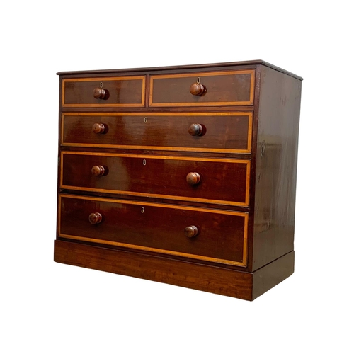 992 - A Victorian inlaid mahogany chest of drawers. 104 x 53 x 93cm.