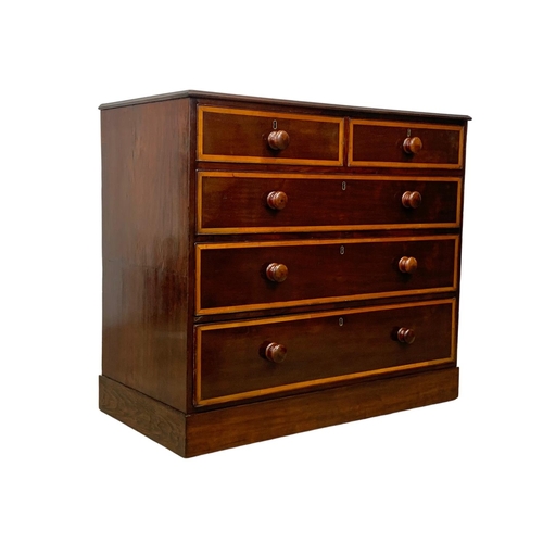 992 - A Victorian inlaid mahogany chest of drawers. 104 x 53 x 93cm.