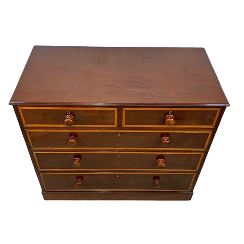 992 - A Victorian inlaid mahogany chest of drawers. 104 x 53 x 93cm.