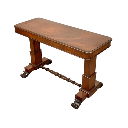 974 - An early Victorian mahogany combination dumbwaiter / side table, with stretcher support and carved p... 