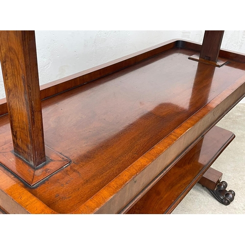 974 - An early Victorian mahogany combination dumbwaiter / side table, with stretcher support and carved p... 