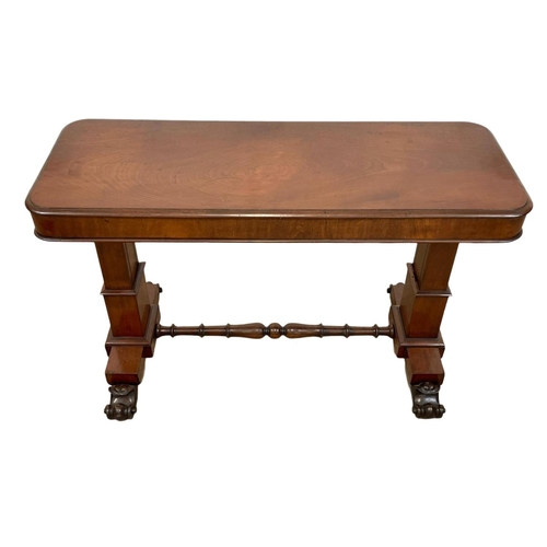 974 - An early Victorian mahogany combination dumbwaiter / side table, with stretcher support and carved p... 