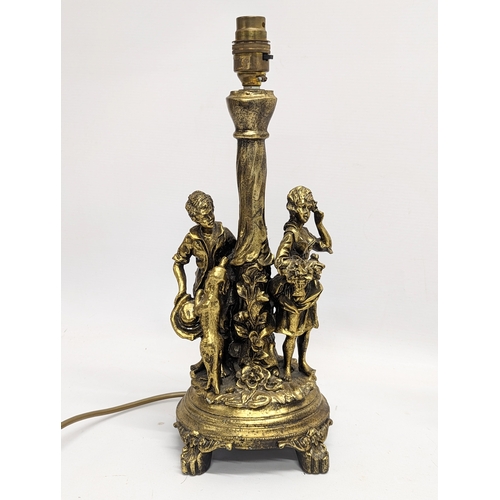 300 - A near pair of gilt table lamps. 37cm