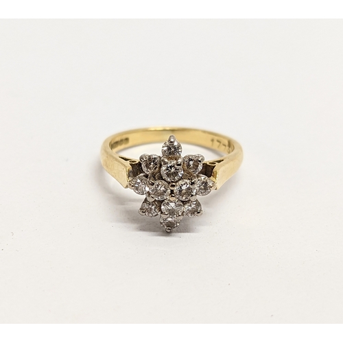 628 - A 18ct diamond cluster ring. Estimate, 0.50ct