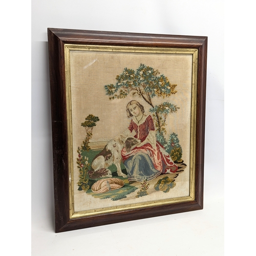 302 - An early - mid Victorian wool worked picture in a rosewood frame. 65.5x75.5cm including frame.