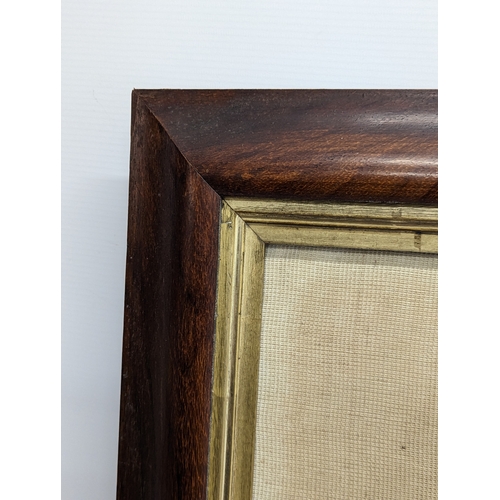 302 - An early - mid Victorian wool worked picture in a rosewood frame. 65.5x75.5cm including frame.