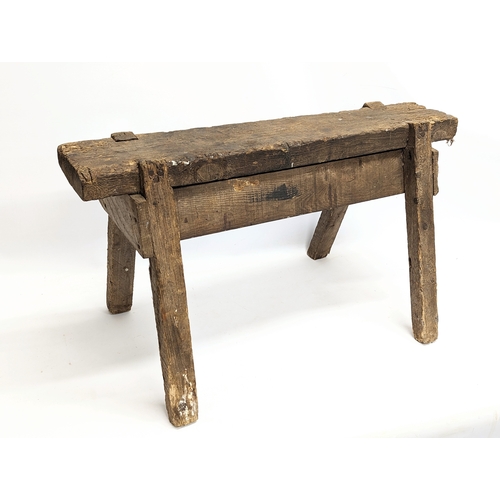 344 - An early 20th century joiners stool. 86x44x49cm