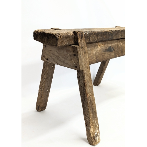 344 - An early 20th century joiners stool. 86x44x49cm