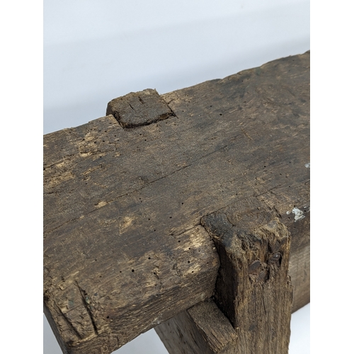 344 - An early 20th century joiners stool. 86x44x49cm