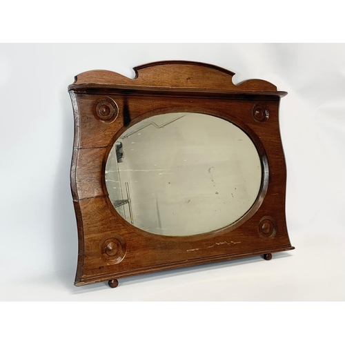 345 - An Edwardian mahogany overmantle mirror. 76 x 64cm