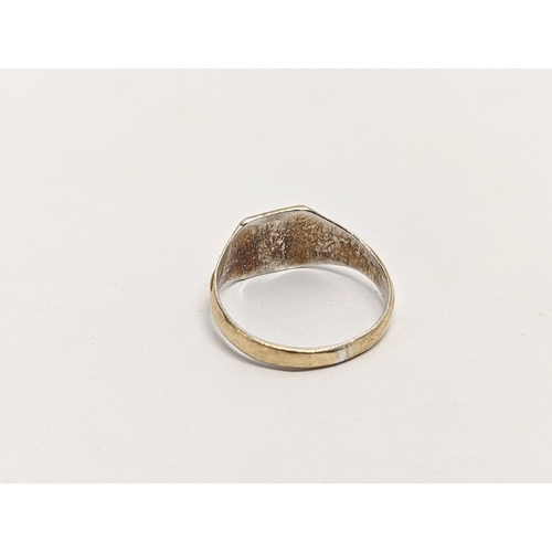 634 - A 9ct gold and silver ring, 2 grams