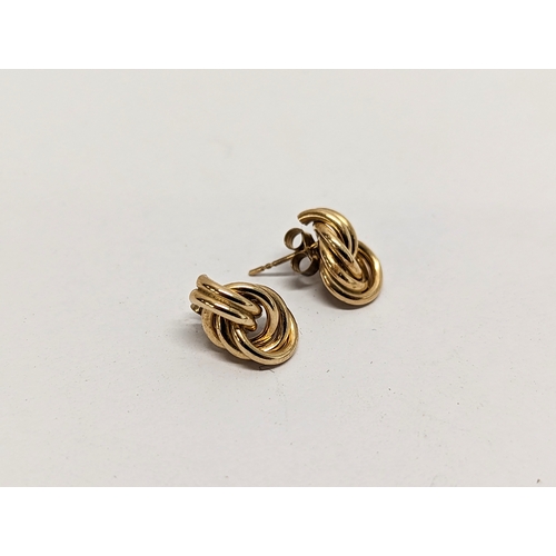 637 - A pair of 9ct gold earrings, 0.7 grams