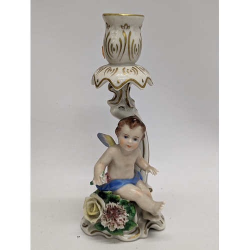 750 - A sundry lot of pottery and 2 gilt framed prints. Including Dresden, Carlton Ware, Border Fine Arts,... 