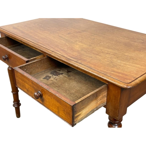 781 - A Victorian mahogany 2 drawer side table. 107 x 60 x 75cm