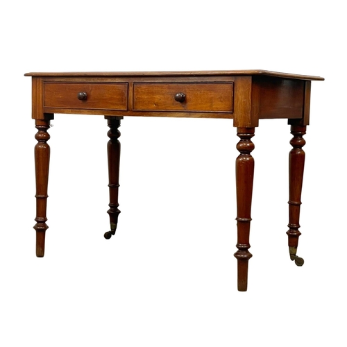 781 - A Victorian mahogany 2 drawer side table. 107 x 60 x 75cm