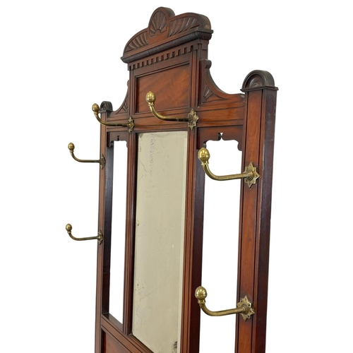 783 - A late Victorian mahogany hallstand. Circa 1900. 89 x 203 x 207cm