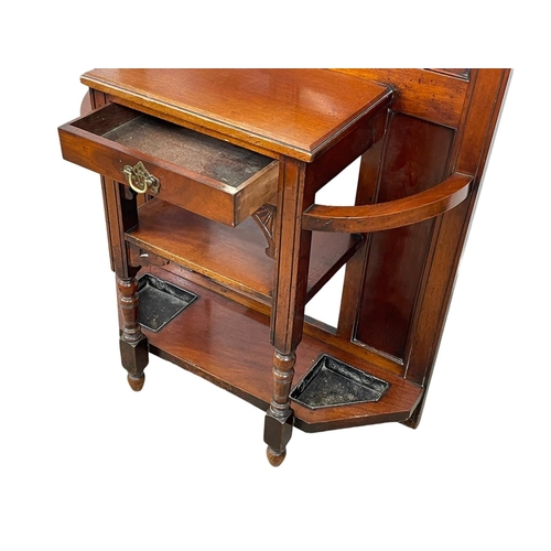 783 - A late Victorian mahogany hallstand. Circa 1900. 89 x 203 x 207cm