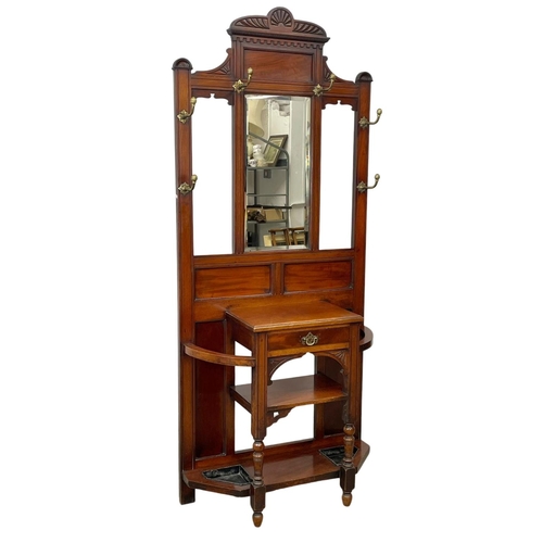 783 - A late Victorian mahogany hallstand. Circa 1900. 89 x 203 x 207cm