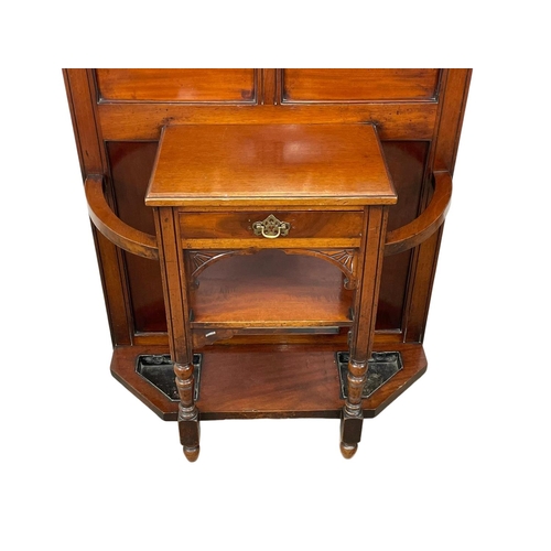 783 - A late Victorian mahogany hallstand. Circa 1900. 89 x 203 x 207cm