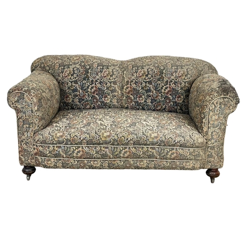 786 - A Victorian drop down club sofa. Circa 1890-1900. 160 x 82 x 78cm