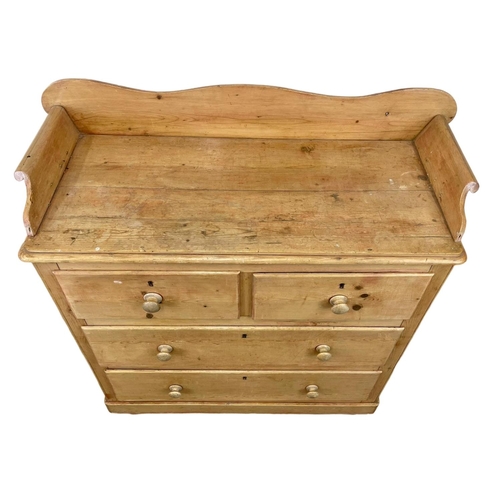 795 - A Victorian pine gallery back chest of drawers. 114 x 47 x 122cm