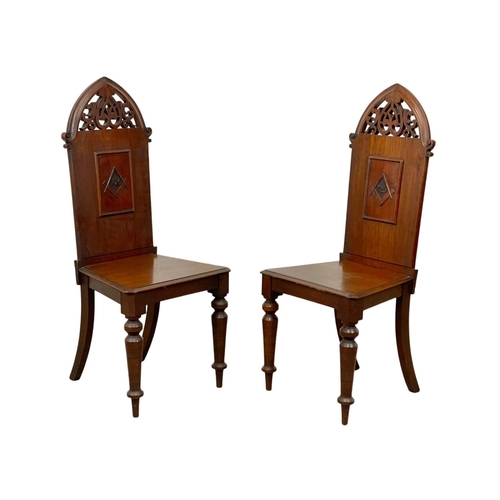 800 - A pair of large Victorian walnut high back Masonic Lodge hall chairs.