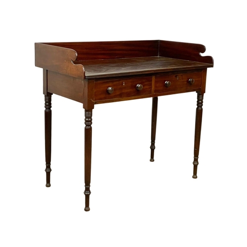 801 - A George IV mahogany washstand with 2 drawers. Circa 1820. 105.5 x 54.5 x 94.5cm