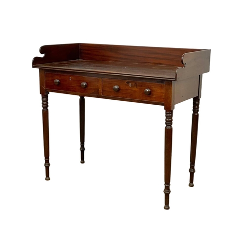 801 - A George IV mahogany washstand with 2 drawers. Circa 1820. 105.5 x 54.5 x 94.5cm